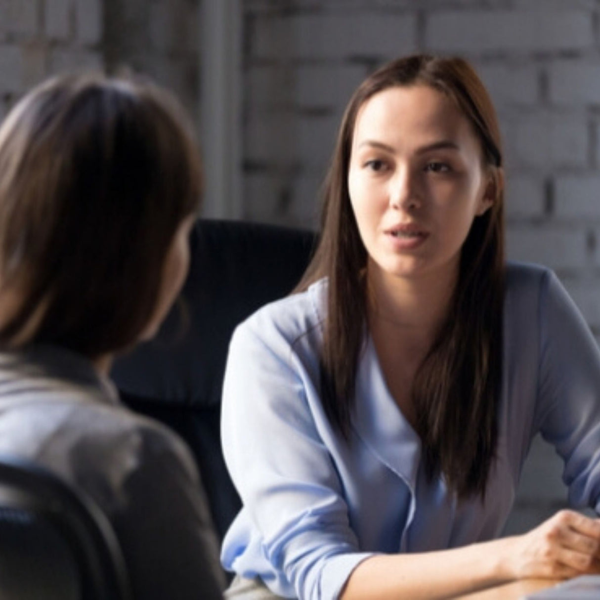female employee giving feedback