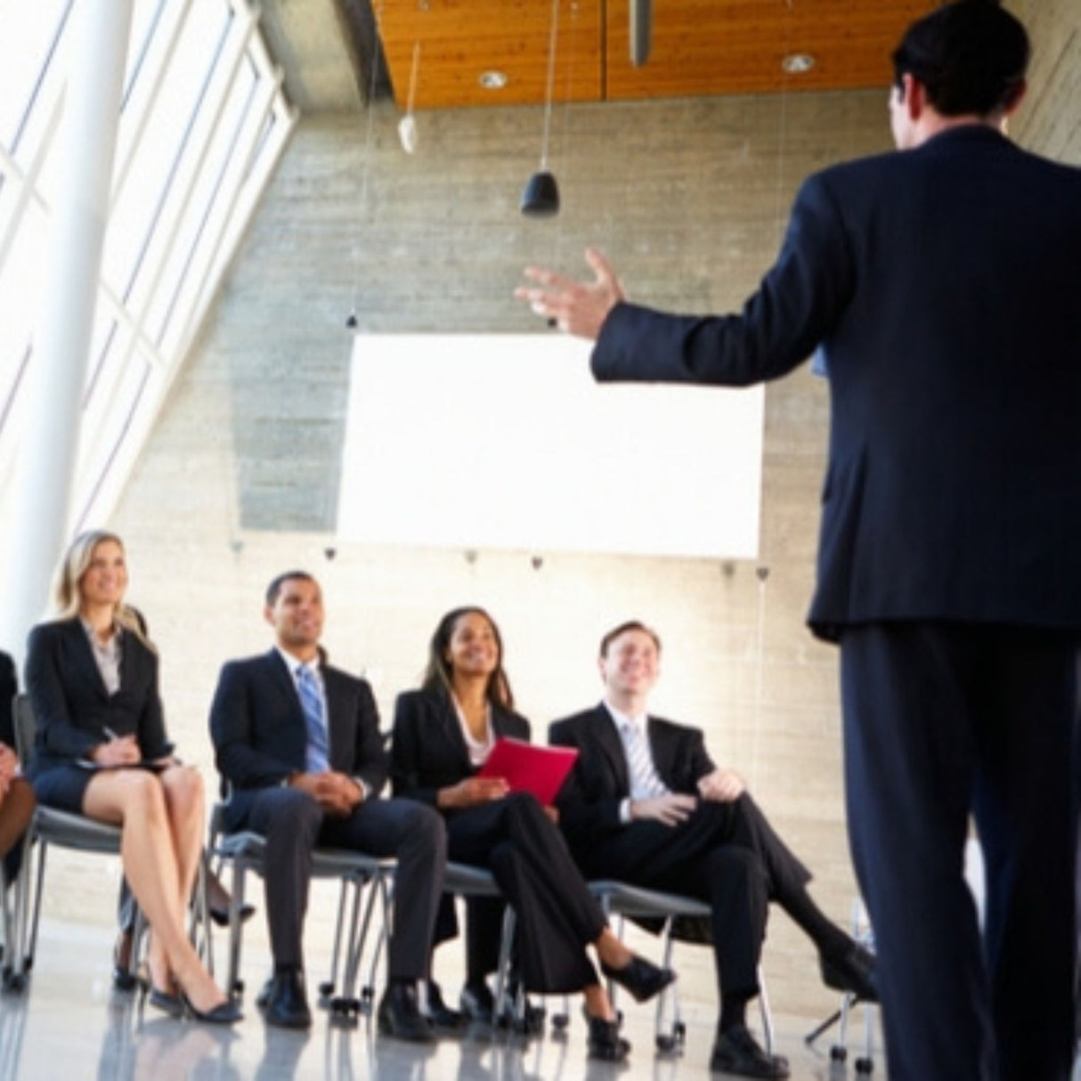 professional speaker in front of crowd