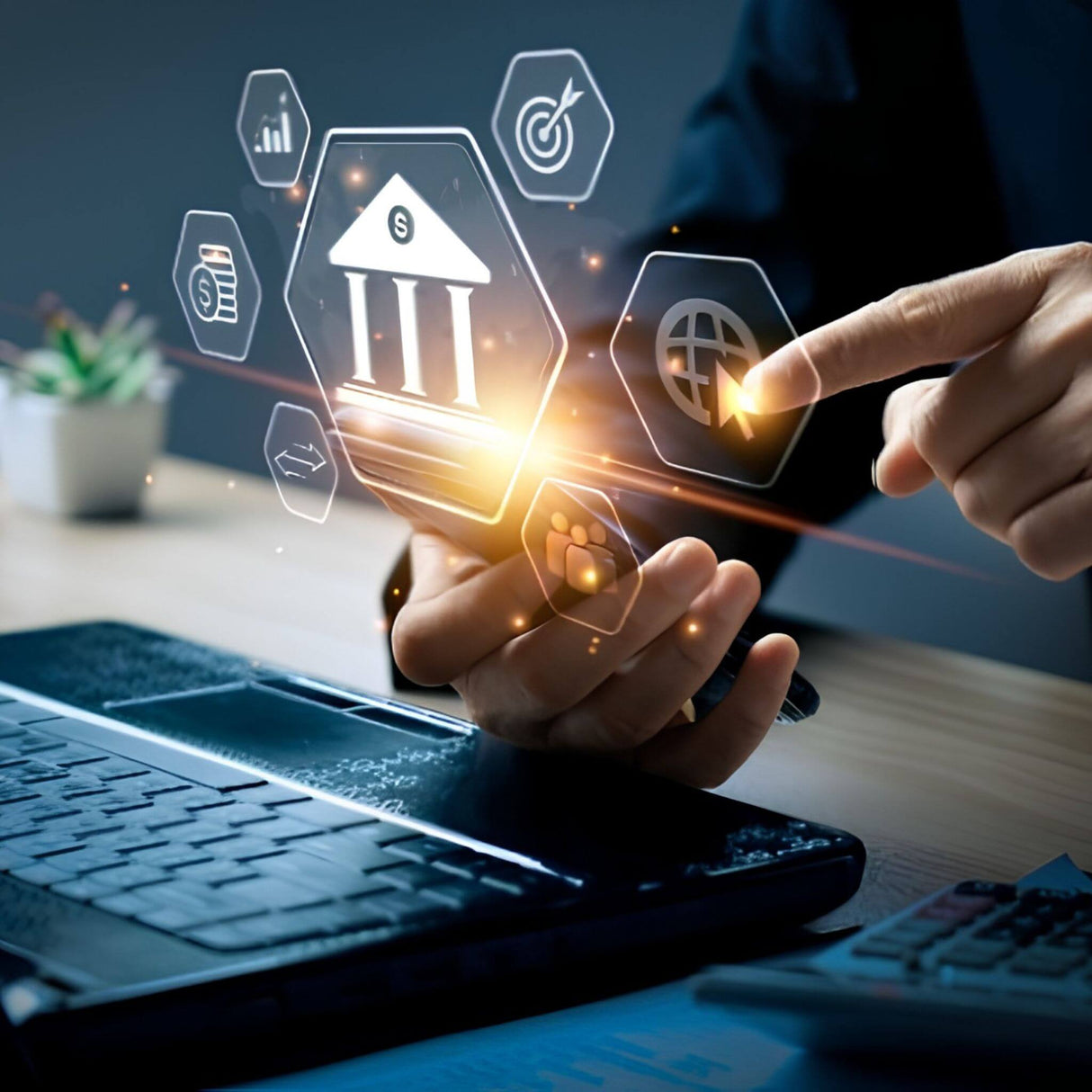Person interacting with digital financial icons on a desk with a laptop.