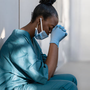 exhausted female nurse