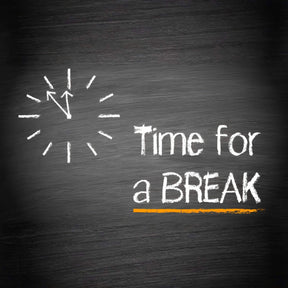 Chalk drawing of a light bulb with 'Time for a Break' text on a blackboard background